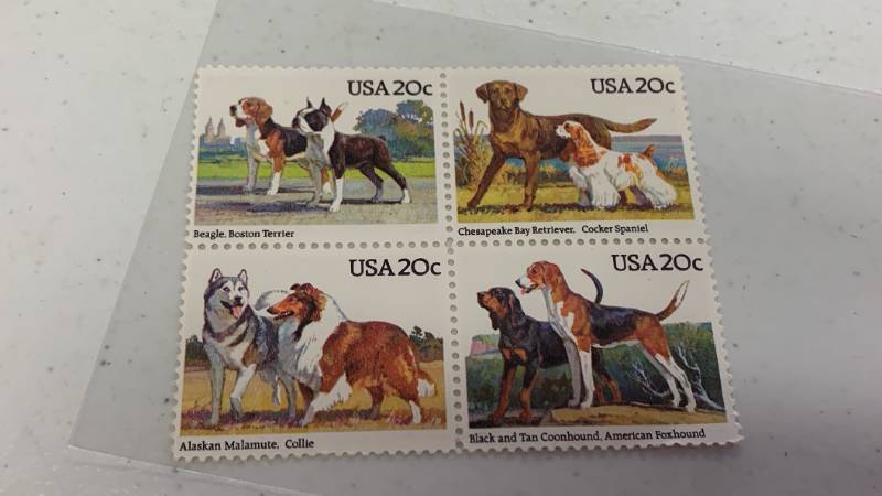 lot 723 image: Vintage USA 20c Postal Stamps featuring dogs vintage