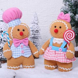 lot 3978 image: GAKSK Christmas Decorations Indoor Gingerbread Plush Hold Candy Cane Home Decor Gifts 11.8inch Gingerbread Stuffed Animal Doll Tree Toppers Christmas Decorations (2PCS)