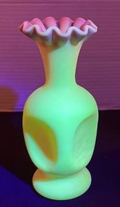 lot 10 image: Fenton UV reactive satin pinch top vase painted with a Burmese treatment