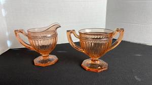 lot 43 image: Imperial Glass colonial pink depression glass creamer and sugar set