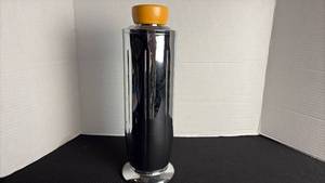 lot 48 image: Vintage art deco, yellow Bakelite and chrome cocktail shaker