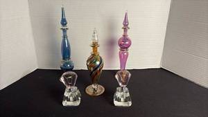 lot 51 image: Egyptian glass and vintage perfume bottles with stoppers