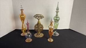 lot 52 image: Egyptian glass and vintage perfume bottles with stoppers