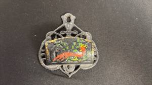 lot 61 image: Vintage cast-iron match holder with lid and stoll painting