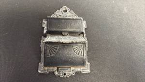 lot 62 image: Vintage Venus and Cupid cast-iron match holder with lid