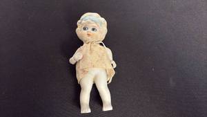 lot 64 image: Antique frozen Charlotte bisque doll