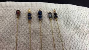 lot 179 image: Vintage hat pins