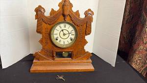 lot 228 image: F.  Mettler Eastlake style mantle clock 16 inches tall