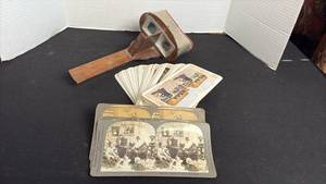 lot 230 image: Antique hand-held wooden stereoscope viewer with picture cards