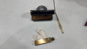 lot 280 image: Vintage gold toned pocket address book with pages and more