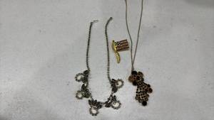 lot 284 image: Womens necklaces and a flag pin