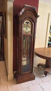 lot 324 image: Howard Miller grandfather clock has all parts 78 x 22 x 13