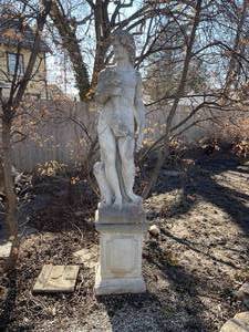 lot 337 image: Concrete garden statue depicting the Roman god Bacchus on concrete base approximately 88 x 18 x 18 in VERY HEAVY will need help and equipment to remove. Easy alley to backyard access.
