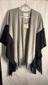 lot 356 image: John Mark suede jacket with tassels size smallmedium new with tags still attached