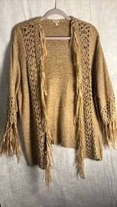 lot 372 image: Reba Brand knit sweater with fringe size large, new tags still attached