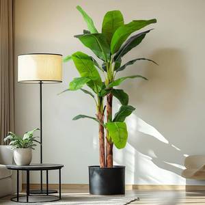lot 710 image: $170 7.2ft Artificial Banana Tree - Tall IndoorOutdoor Banana Plant