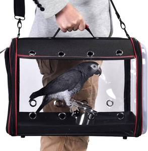 lot 715 image: $80 Colorday Lightweight Bird Carrier, Cage with Perch, Black