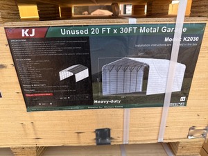lot 2133 image: Unused KJ Metal K2030. 20x30x14 Fully Enclosed sides Carport.  Cream in Color.  I have this exact same structure here at Red Stag Auctions and its nice