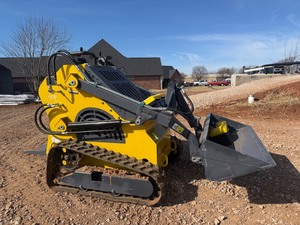lot 2332 image: Unused Starvox SV-480 Mini Skid Steer 2 cylinder Gas engine, Dumping height 60 inches, Very Similar to the Arteer QB-480 which are one of the best I have ever sold.  Great Machines