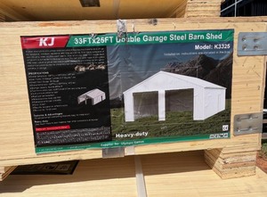 lot 2350 image: Unused KJ Metal K3325  33x25x14 Double Garage Steel Barn  Cream in color, garage doors not included.