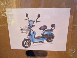 lot 2453 image: Unused IREV Electric Motorcycle  Very cool little machines