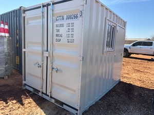 lot 2140 image: Unused Captok 10 Foot Storage Container with window and door - very nice unit