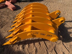 lot 2195 image: Unused CAPTOK CAT 305 Excavator Rake with Teeth �� 32 in