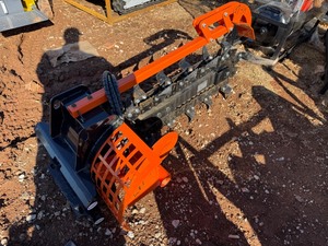 lot 2497 image: Unused Heavy Duty Mini Skid Steer Trencher