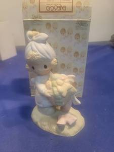 lot 5267 image: Precious Moments Be Not Weary In Well Doing Figurine in box