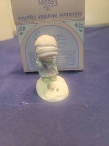 lot 5350 image: Precious Moments February Birthday Figurine