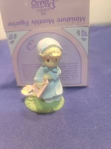 lot 5352 image: Precious Moments March Monthly Figurine