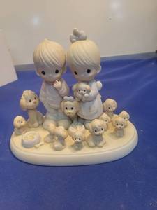 lot 5459 image: 1987 Precious Moments The Good Lord Has Blessed Us Tenfold Figurine