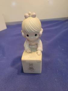 lot 5460 image: 1987 Precious Moments Sharing is Universal Figurine
