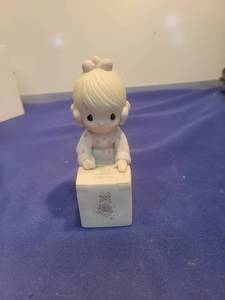 lot 5463 image: 1987 Precious Moments Sharing is Universal Figurine