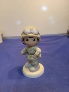 lot 5500 image: Precious Moments Military Figure - Im Proud To Be An American