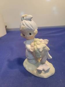 lot 5509 image: 1979 Precious Moments Be Not Weary Figurine