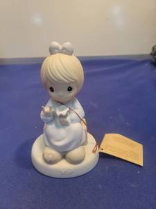 lot 5534 image: Precious Moments A Universal Love 1992 Limited Edition Figurine