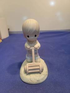 lot 5554 image: Precious Moments Figurine - Boy with Lawn Mower