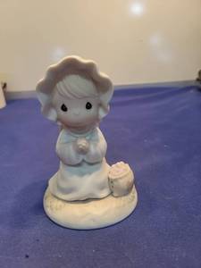 lot 5557 image: Precious Moments Sowing Seeds of Kindness Figurine