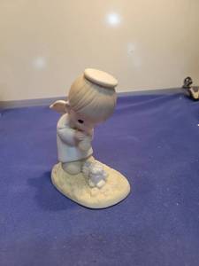 lot 5596 image: Precious Moments Gods Ray of Mercy Figurine