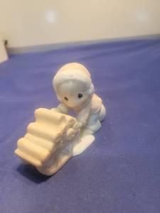 lot 5631 image: Precious Moments White Porcelain Figurine - Child with Books