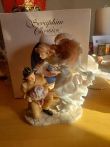 lot 5710 image: Seraphim Classics Angel with Fireman Figurine #81775