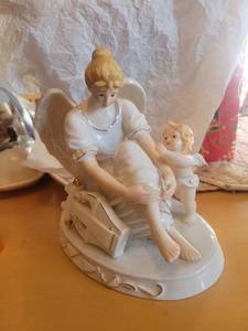 lot 5731 image: White Porcelain Mother and Child Playing Piano Figurine