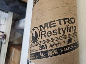 lot 554 image: Metro Restyling Wrap. BLACK. Unknown Demensions