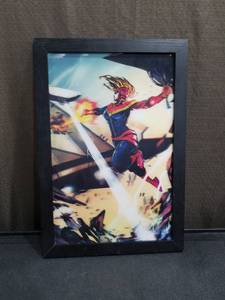 lot 3640 image: Captain Marvel Framed Comic Art Print