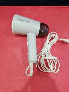 lot 3689 image: Rowenta Travel Steam Handheld Steamer 2.3 Oz Tank Capacity, Foldable,Easy Steam, Effortless wrinkle removal, 1100 watts Portable, Ironing, Fabric Steamer, Vacation Essentials, Gray, DR1011