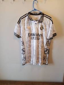 lot 115 image: Real Madrid Emirates Fly Better Jersey 202021