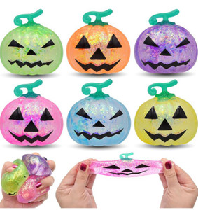 lot 3285 image: Squishy Glitter Halloween Pumpkin Stress Toys