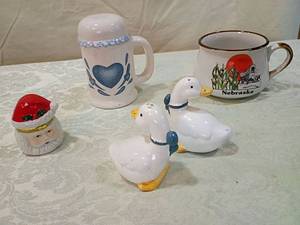 lot 21 image: Decorative Salt & Pepper Set with Nebraska Mug