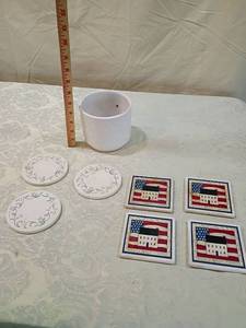 lot 24 image: American Folk Art Coaster Set with Ceramic Cup  3 round coaster